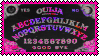 Stamp with a pink glittery ouija board